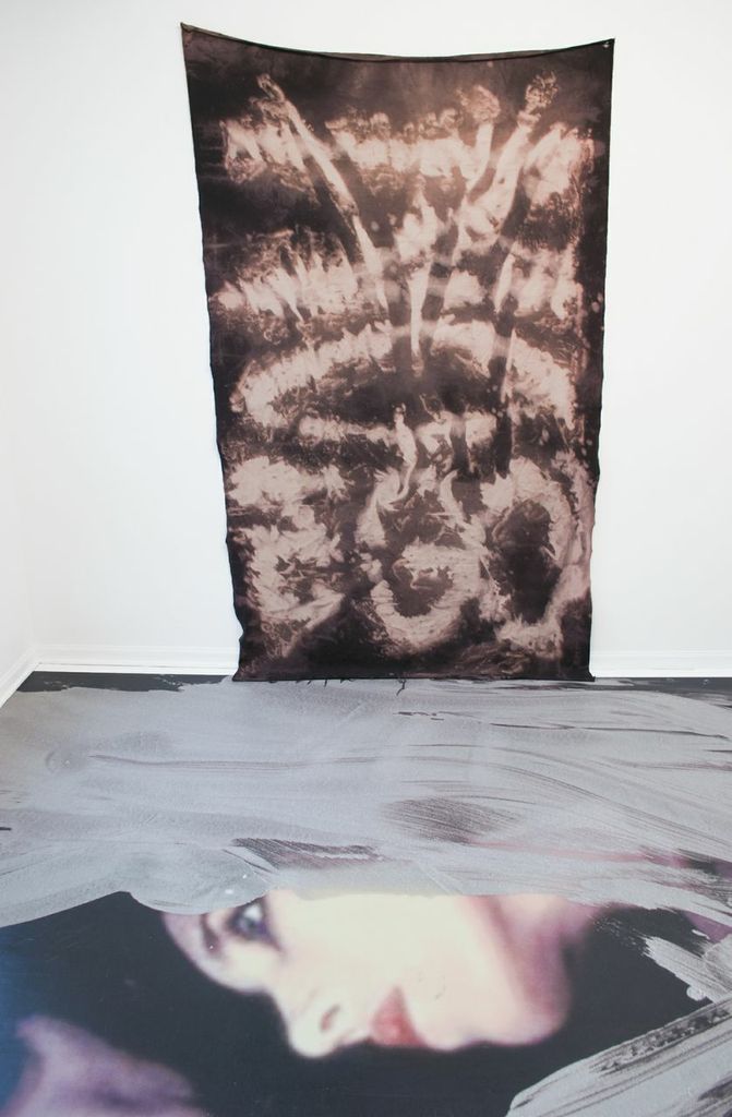 Wall: Brandon Seckler, NO EGO (Negative), 2013; floor: Oliver Henry, Lick My Decals Off, Baby