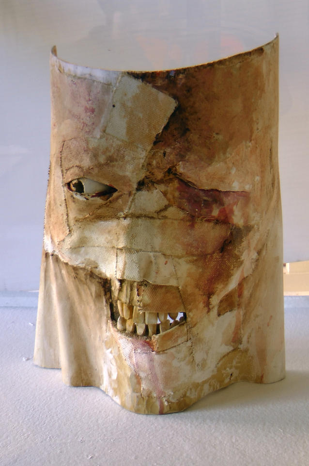 Randolph Harmes Ritual Suicide Mask. 12 x 9 x 3/12 inches, Hard Wood, Mixed Media and Found Objects, date unknown.